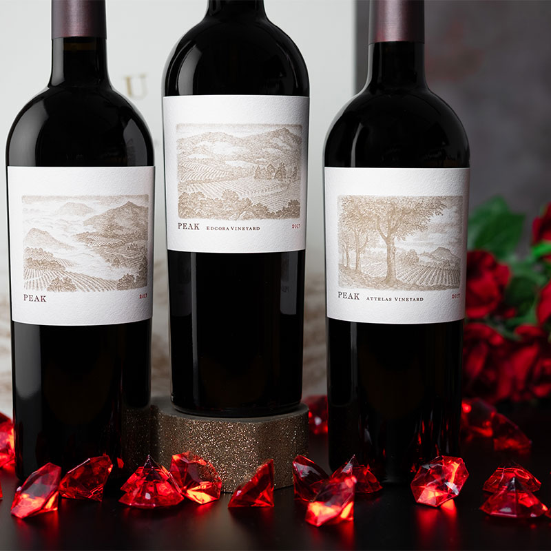 Three Bottles with Red Diamonds
